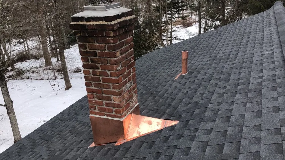 Slide of The Roof Specialist