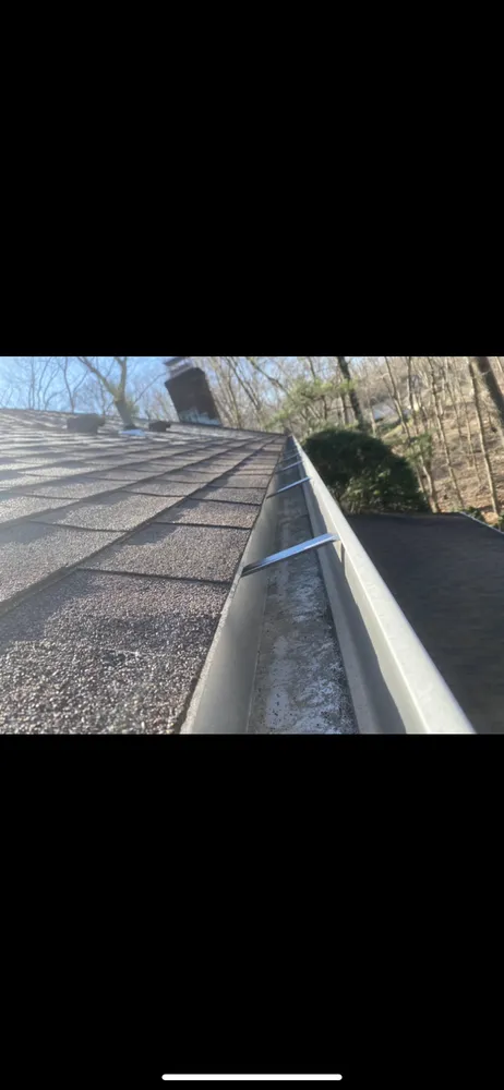 Slide of The Roof Specialist