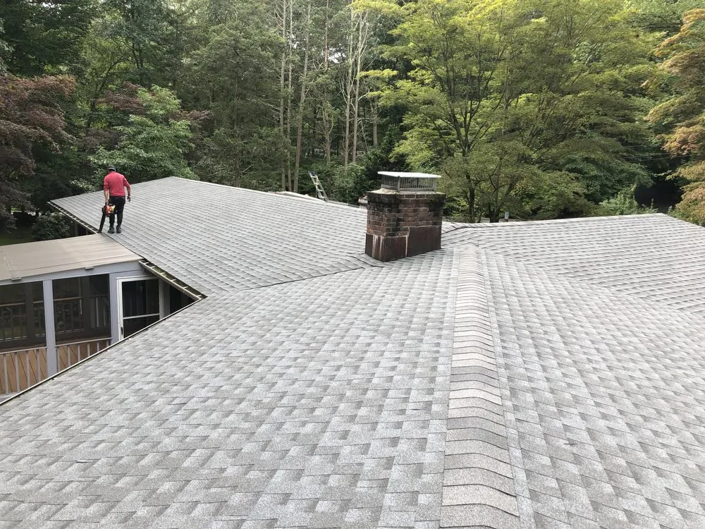Slide of The Roof Specialist