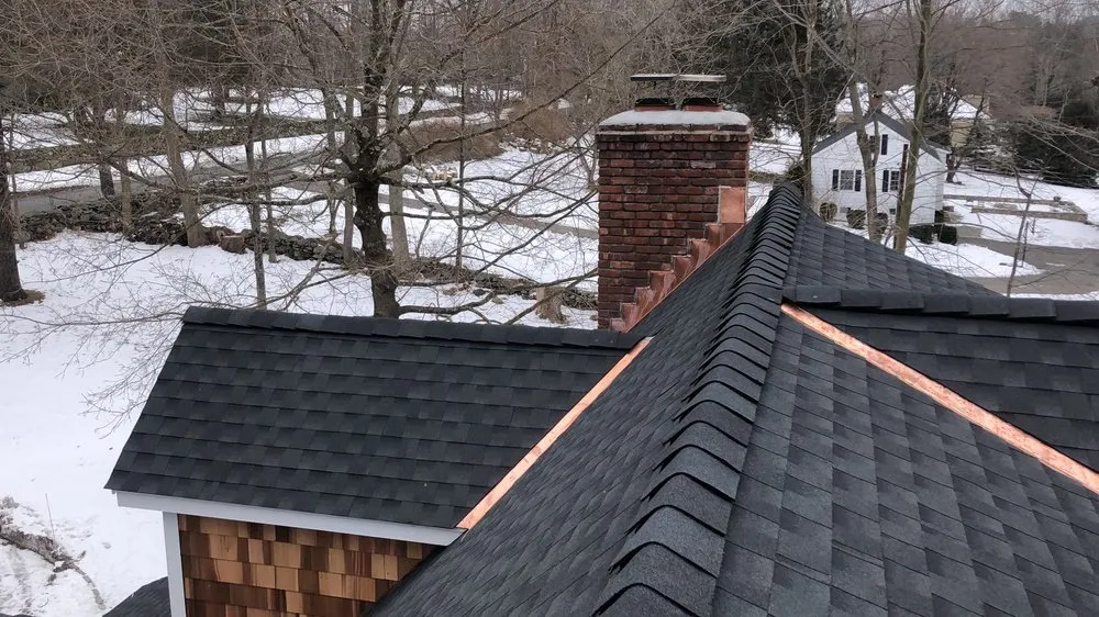 Slide of The Roof Specialist
