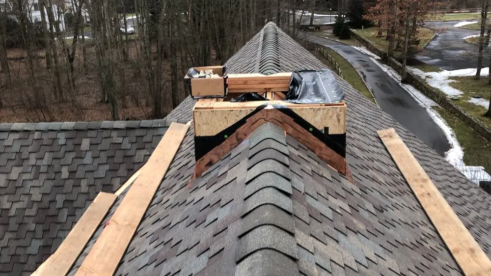 Slide of The Roof Specialist