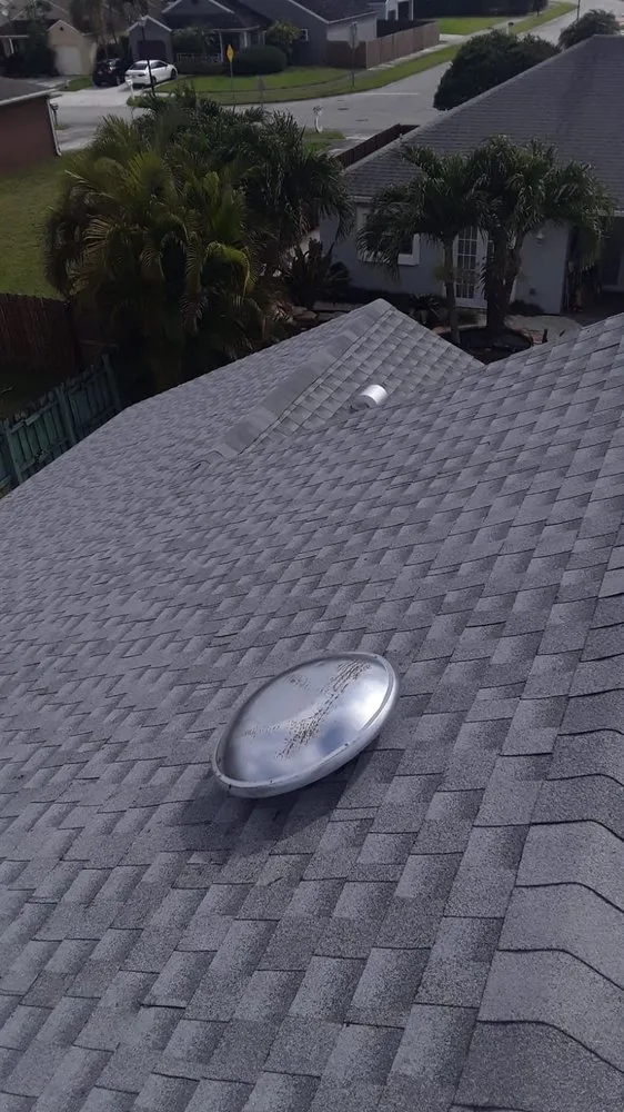 Slide of The Roof Xperts