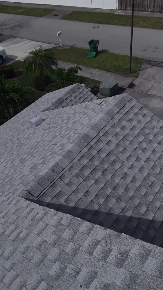 Slide of The Roof Xperts