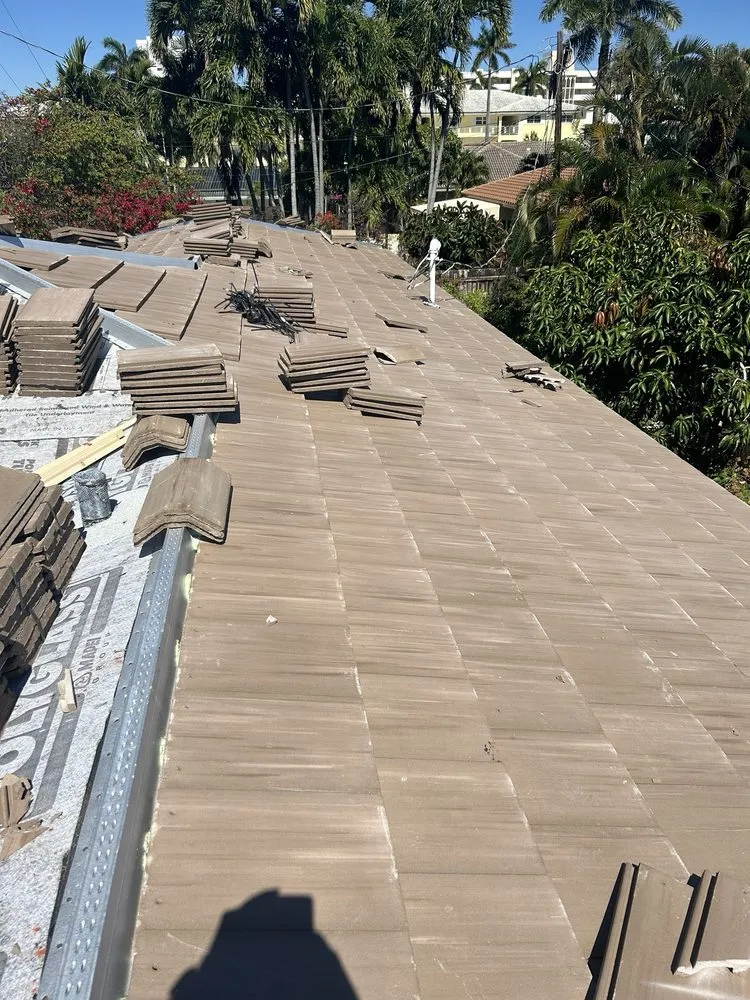 Slide of The Roof Xperts