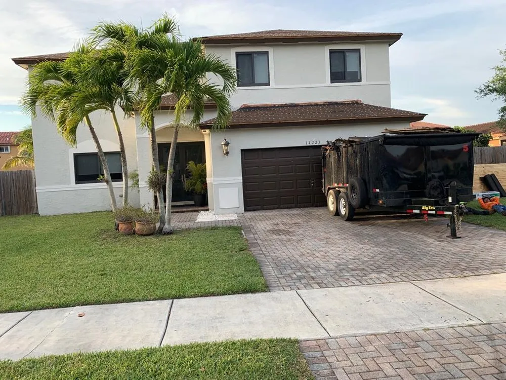 Slide of The Roof Xperts