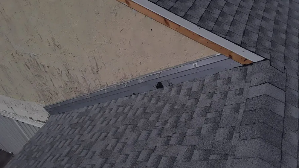 Slide of The Roof Xperts