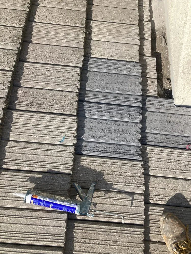 Slide of The Roofers Company