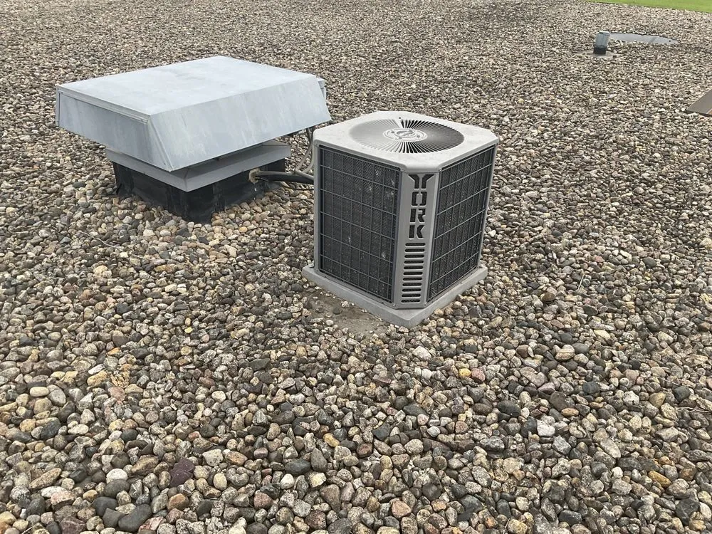 Slide of The Roofing & Construction