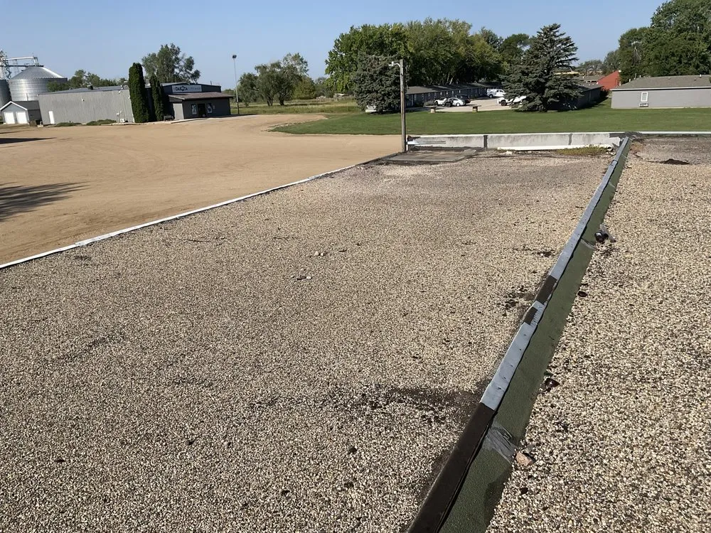 Slide of The Roofing & Construction