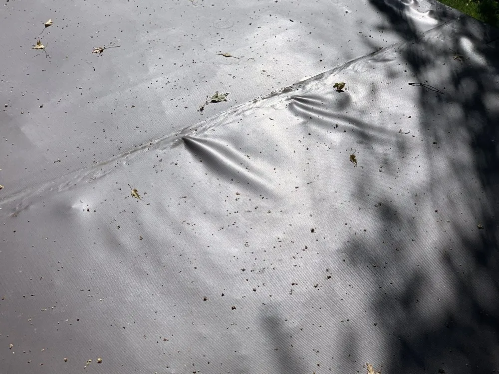 Slide of The Roofing Center