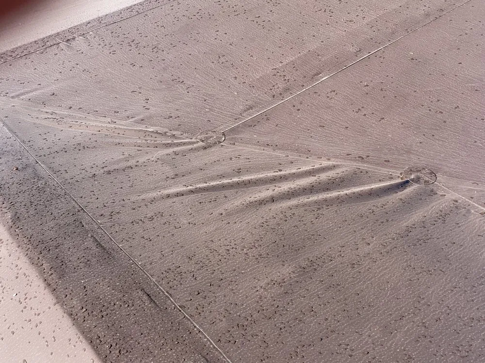 Slide of The Roofing Center