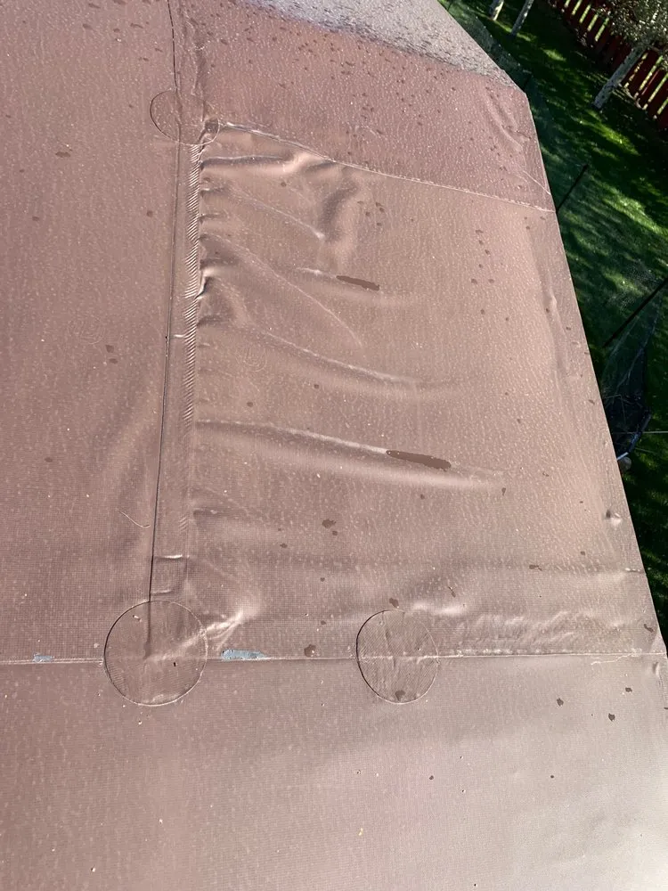 Slide of The Roofing Center