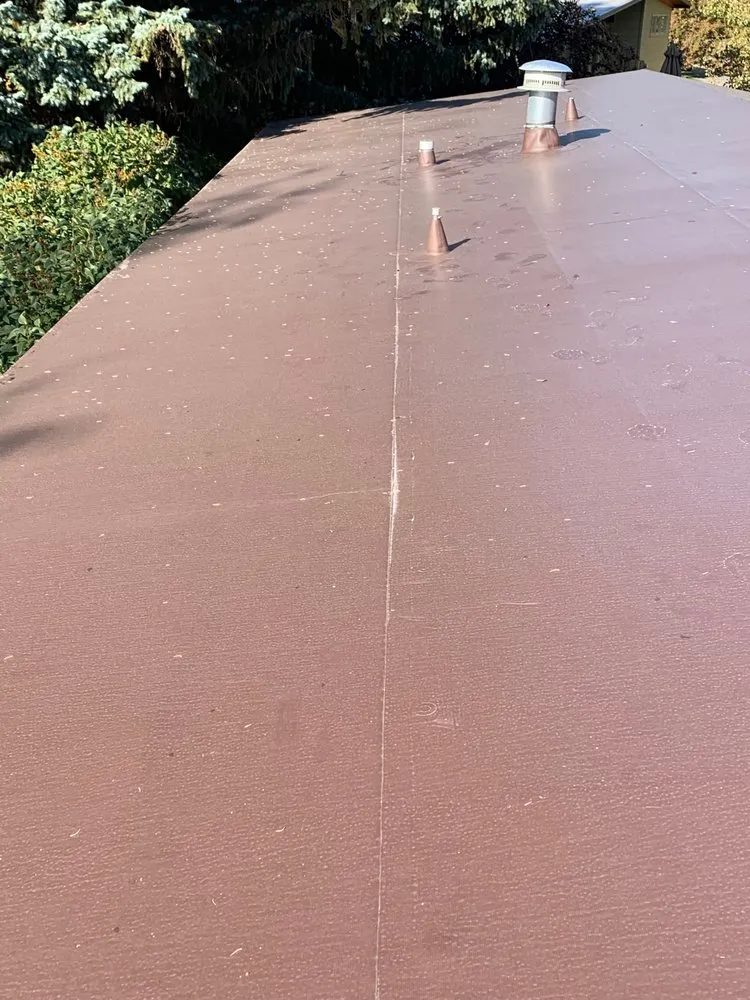 Slide of The Roofing Center