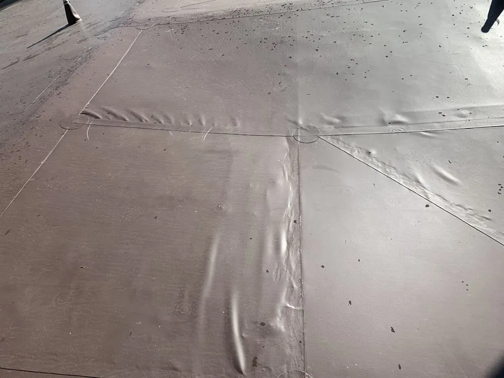 Slide of The Roofing Center