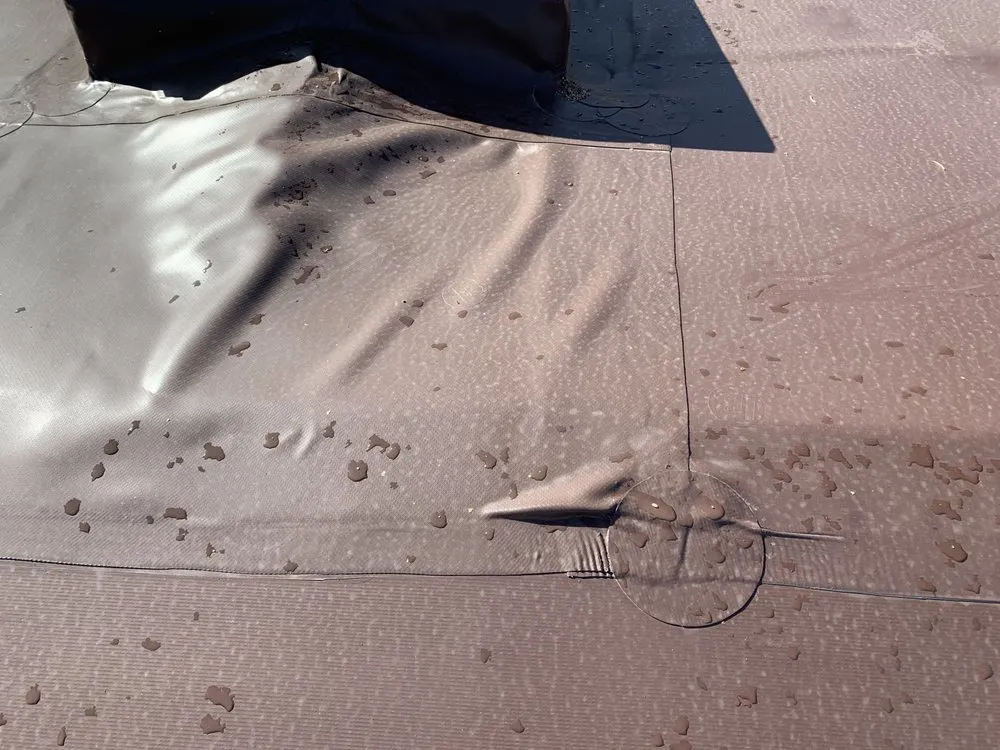 Slide of The Roofing Center