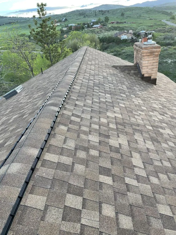 Slide of The Roofing Center