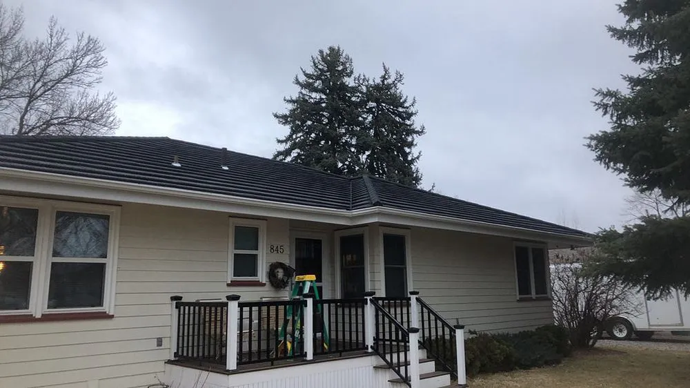 Slide of The Roofing Center