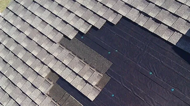 Slide of The Roofing Co.