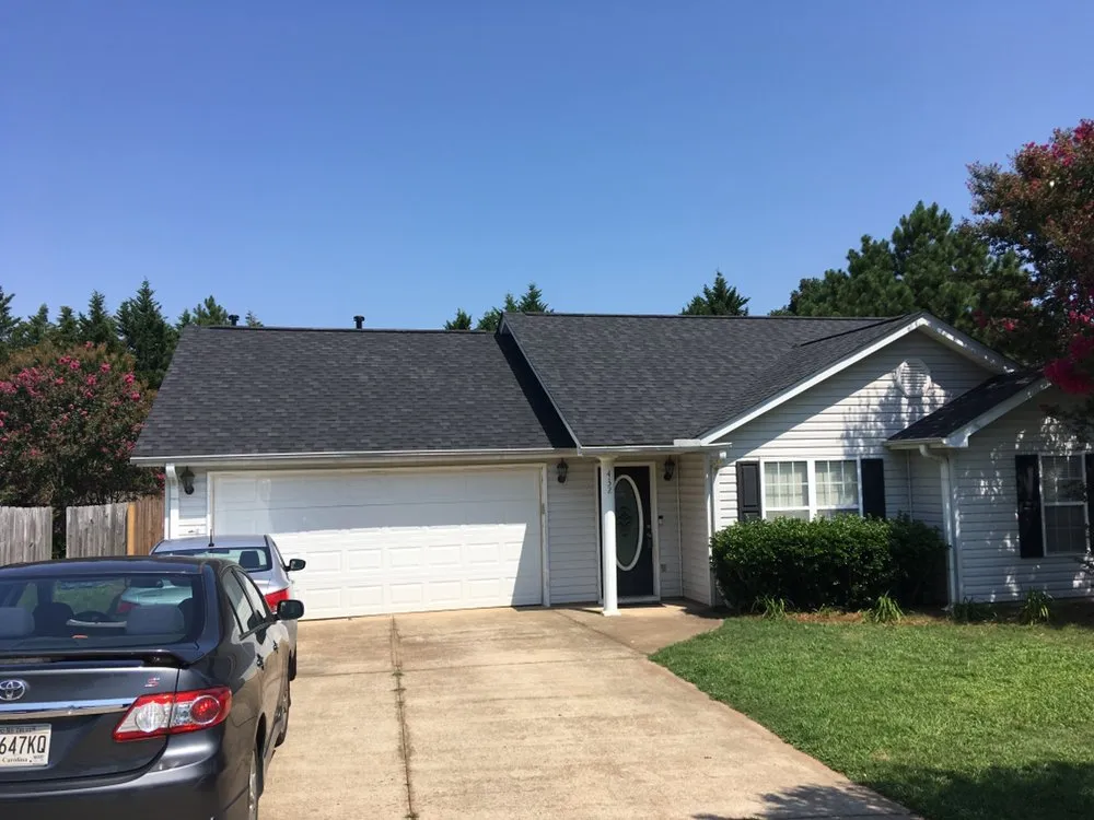 Slide of The Roofing Company