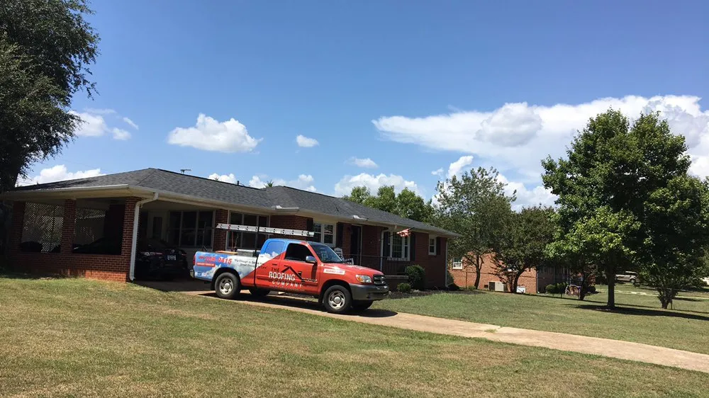 Slide of The Roofing Company