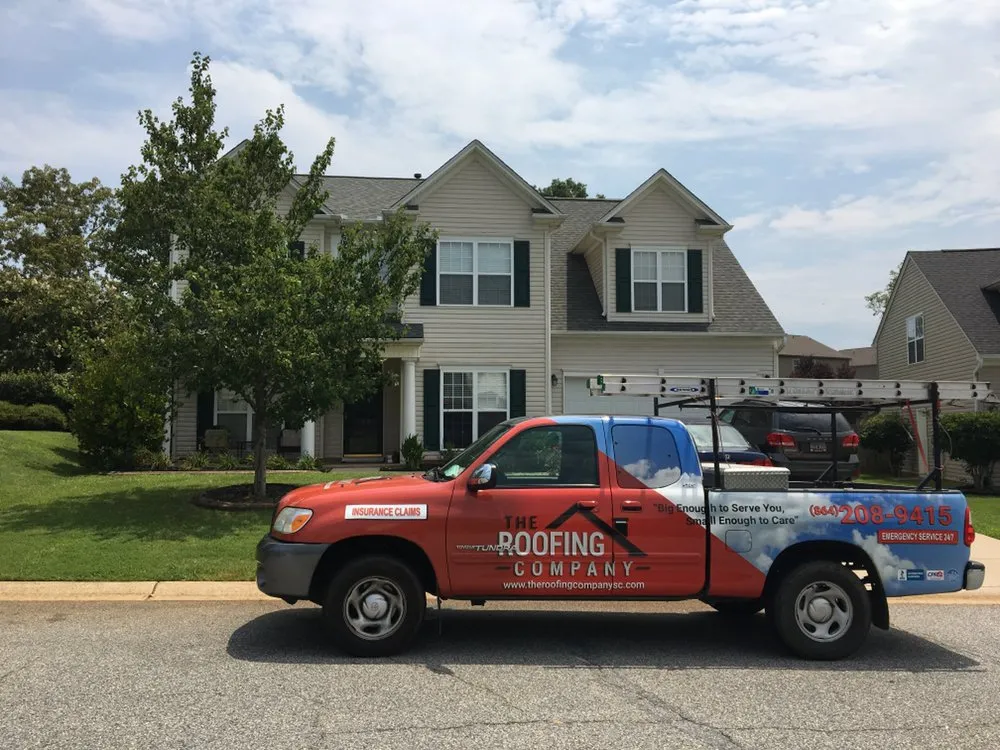 Slide of The Roofing Company
