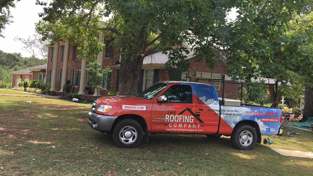 Slide of The Roofing Company