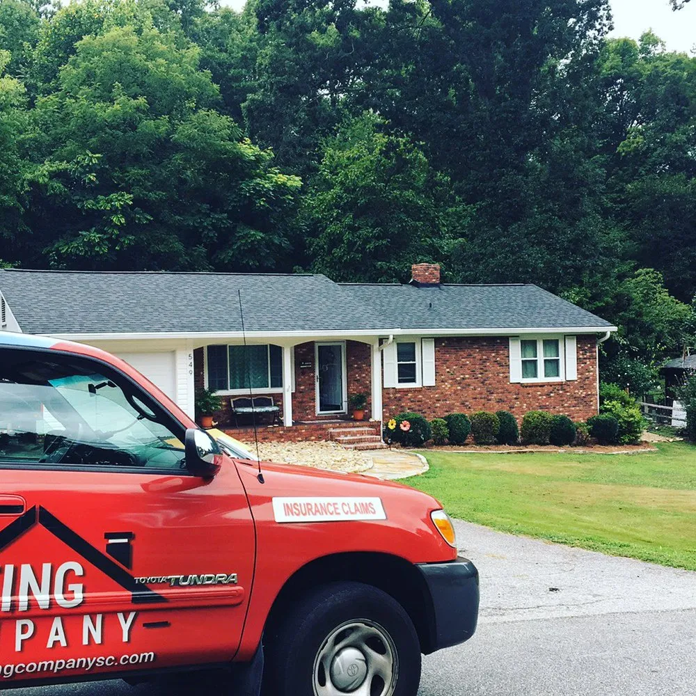 Slide of The Roofing Company