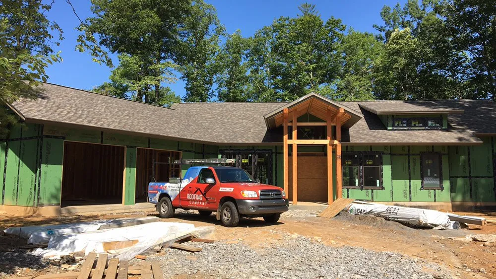 Slide of The Roofing Company