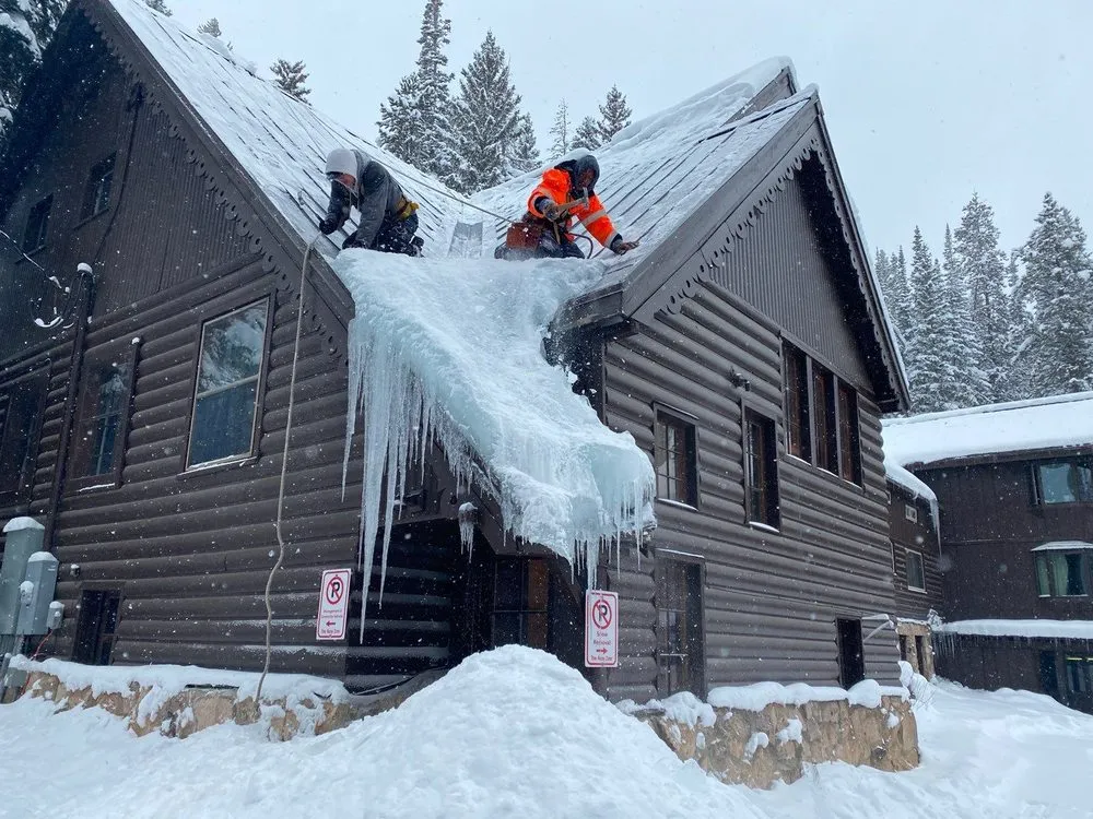 Slide of The Roofing Company