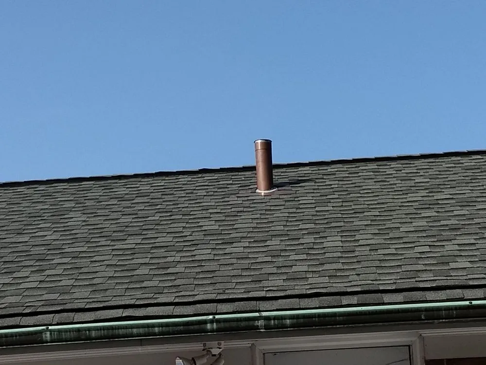 Slide of The Roofing Company