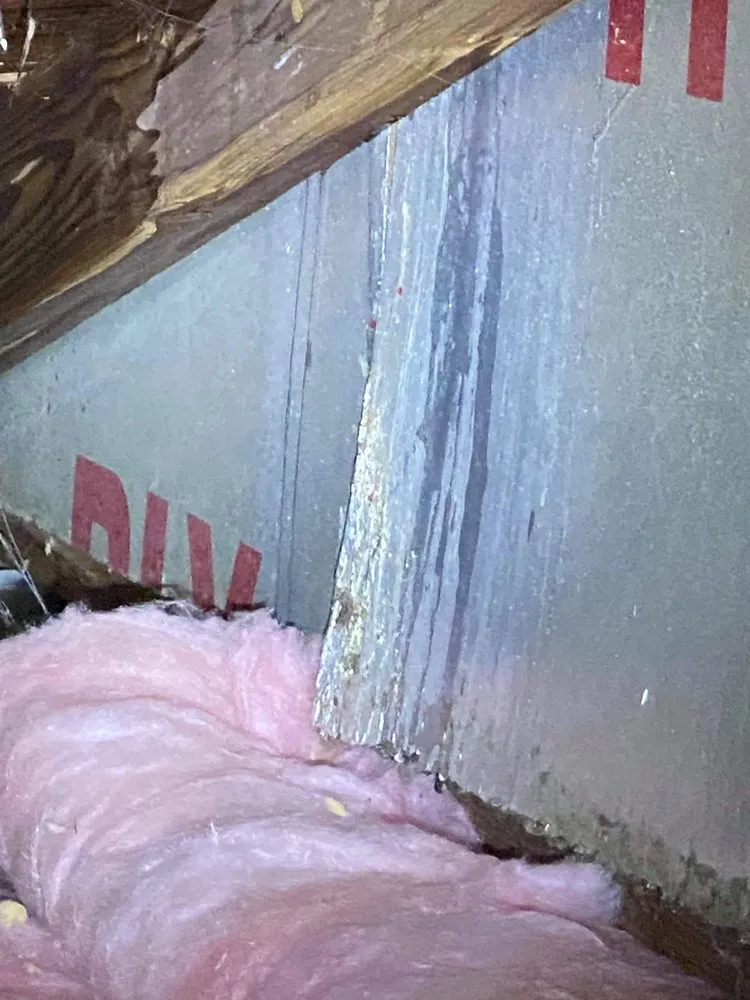 Slide of The Roofing Company