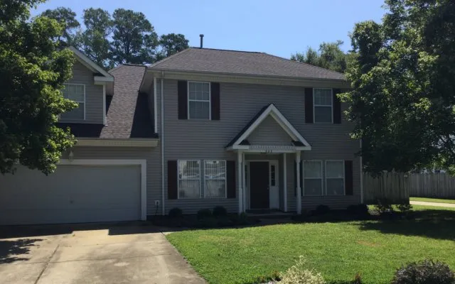 Slide of The Roofing Company