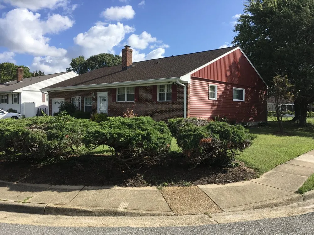 Slide of The Roofing Company