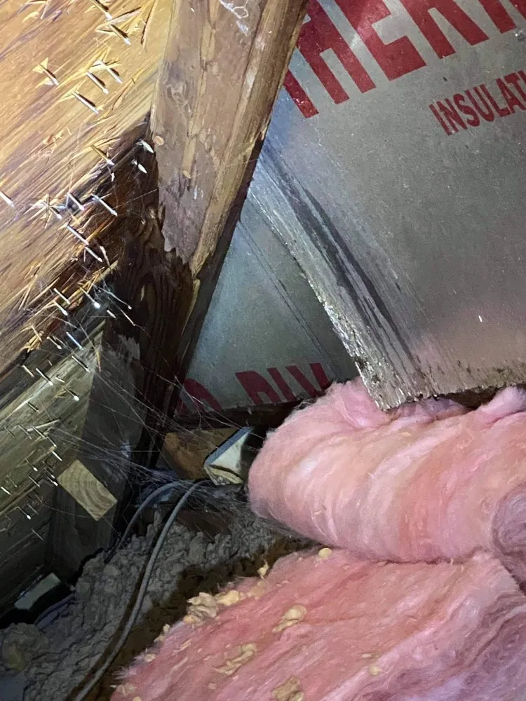 Slide of The Roofing Company