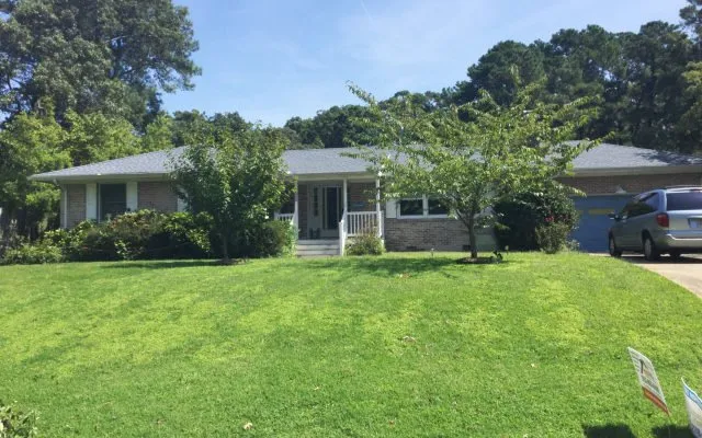 Slide of The Roofing Company