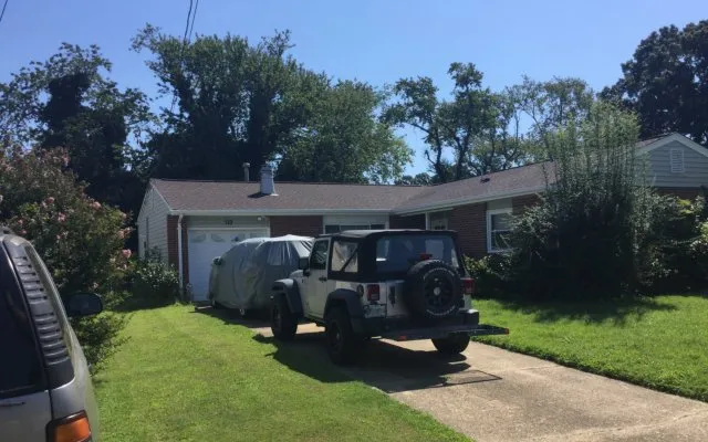 Slide of The Roofing Company