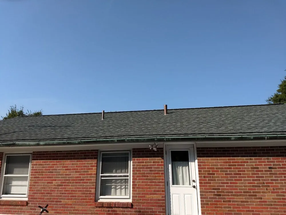 Slide of The Roofing Company