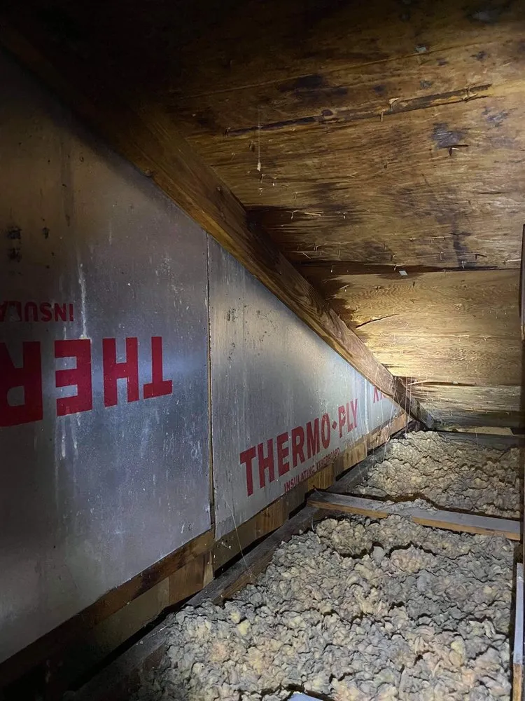 Slide of The Roofing Company