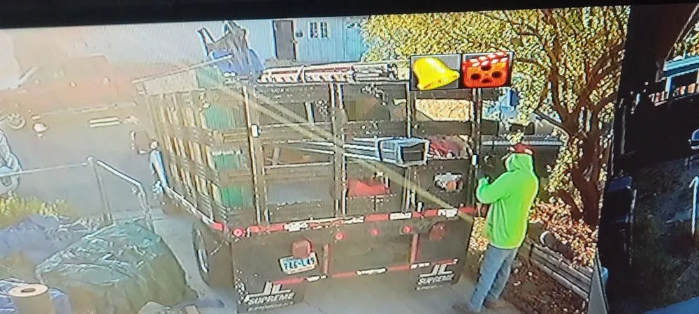 Slide of The Roofing Company