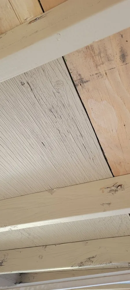 Slide of The Roofing Company