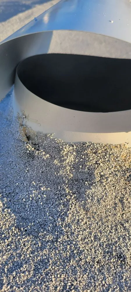 Slide of The Roofing Company