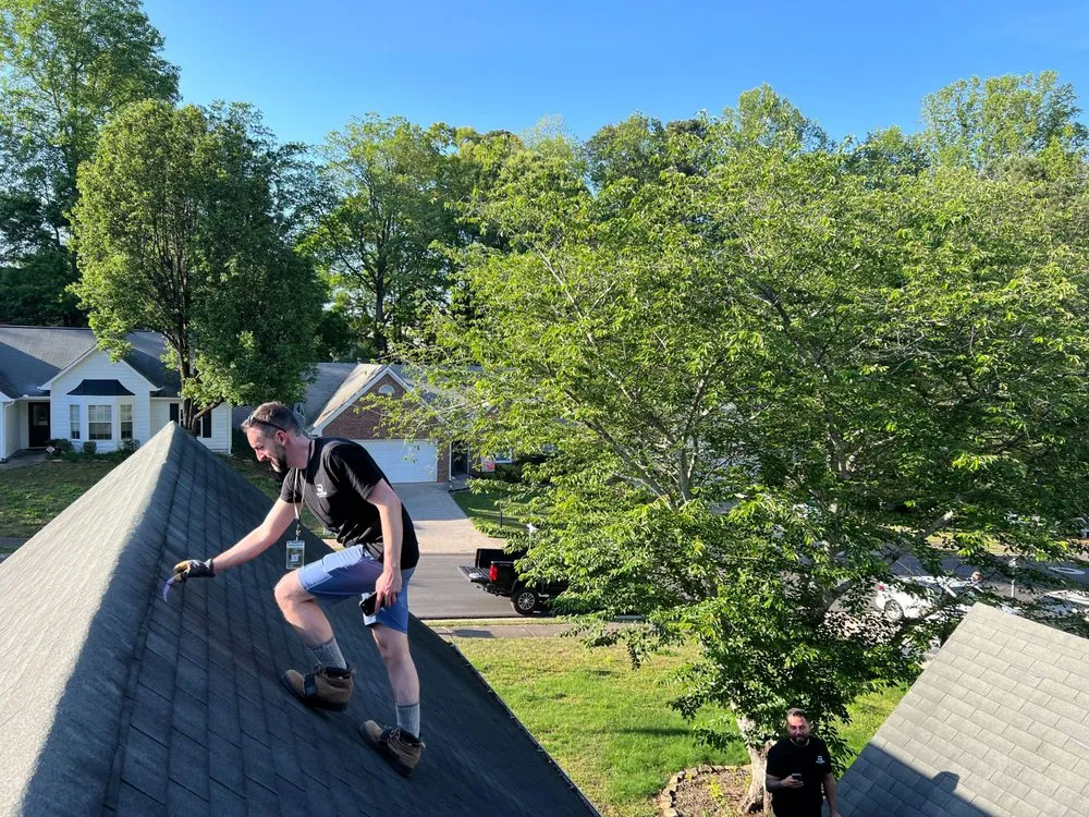 Slide of The Roofing Company