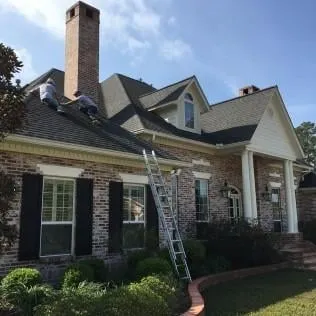 Slide of The Roofing Company