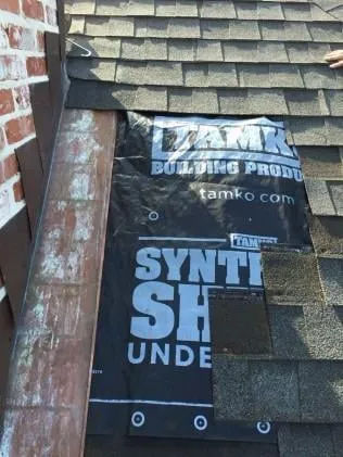 Slide of The Roofing Company