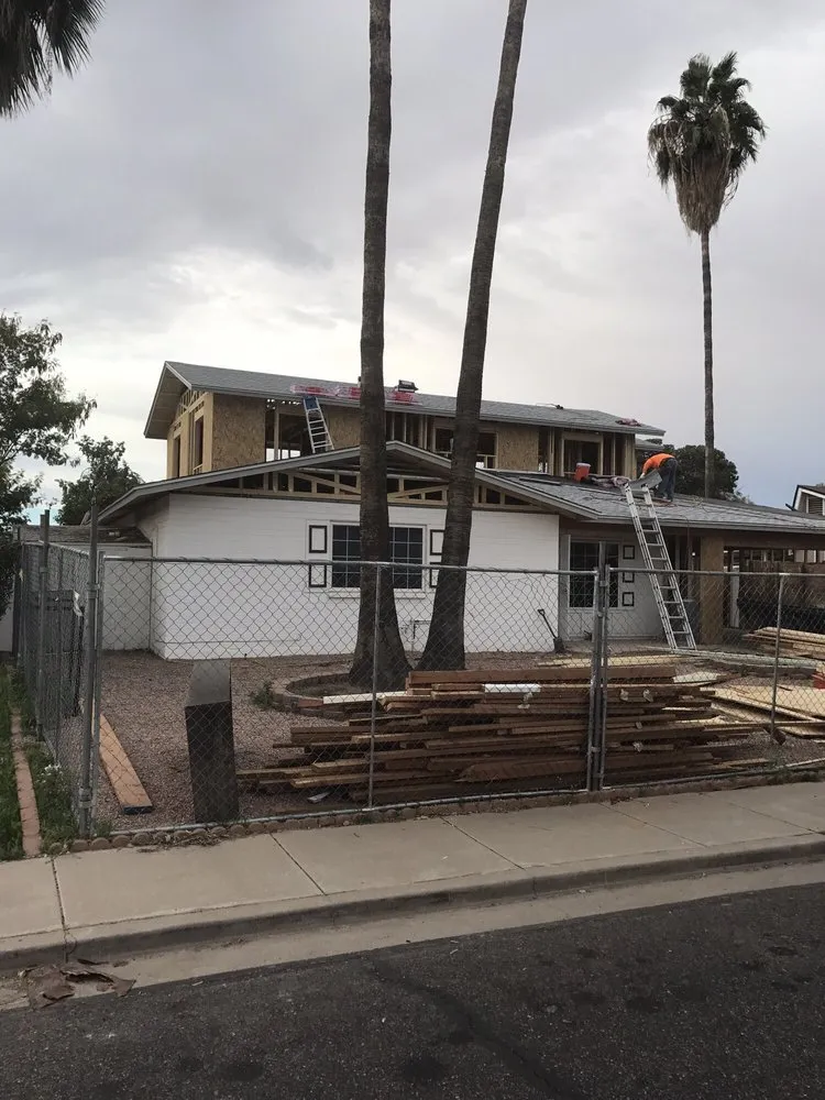 Slide of The Roofing Company