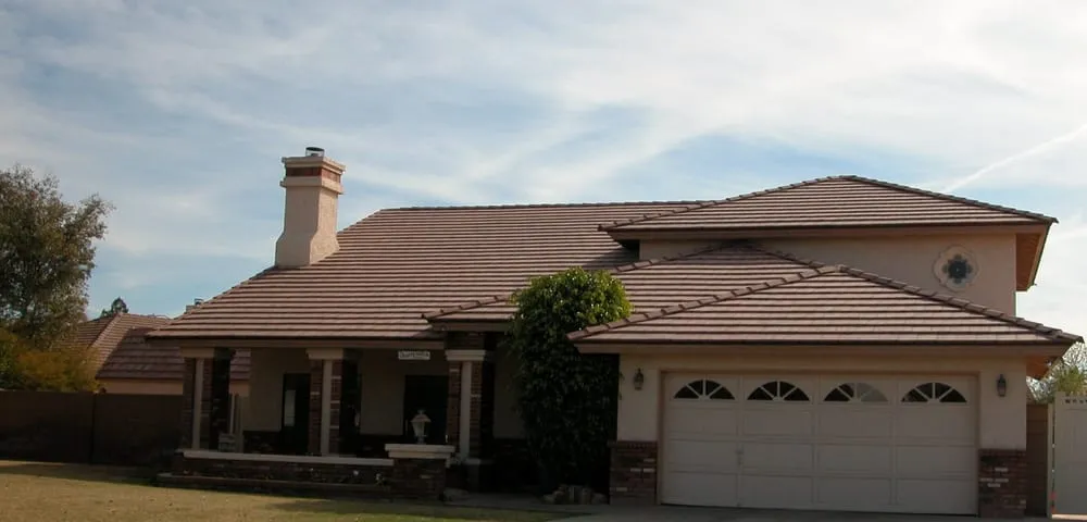 Slide of The Roofing Company