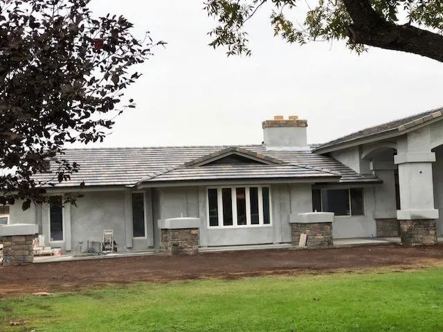 Slide of The Roofing Company