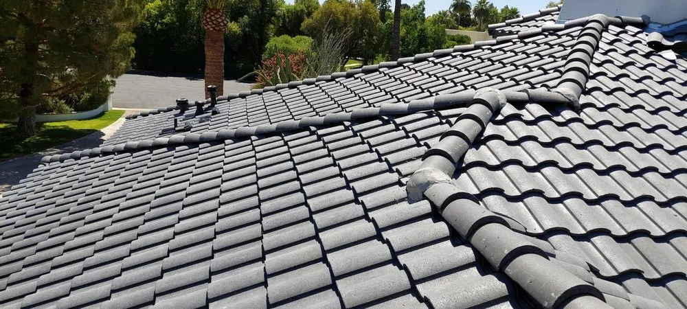 Slide of The Roofing Company