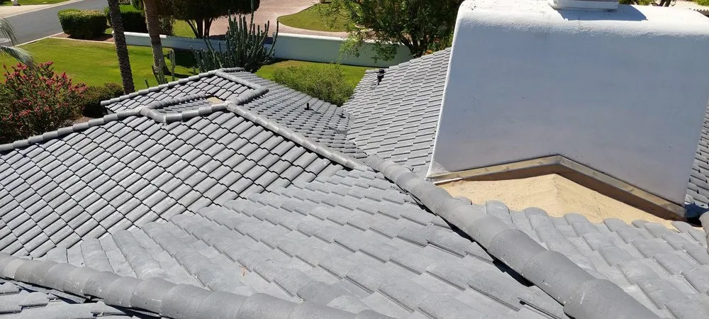 Slide of The Roofing Company