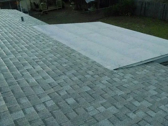 Slide of The Roofing Company